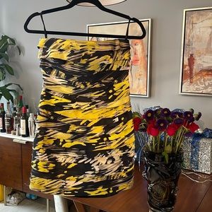 Bebe. Strapless mini dress. Yellow and black. Size S